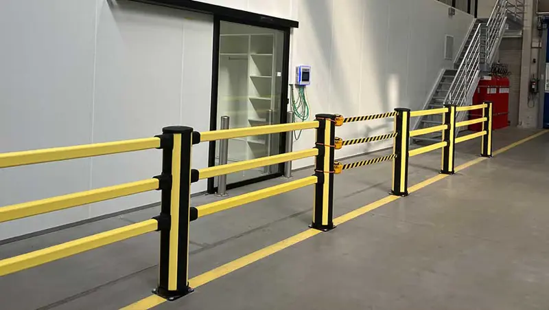 black and yellow pedestrian barriers