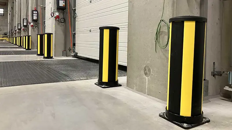 many impact protection bollards protecting gateways in dispatch environment